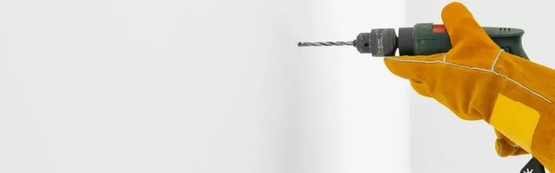 Jak skutecznie wiercić dziury pod kołki w różnych materiałach?